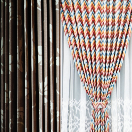 Patterns bring life and character to a room. Picture of 2 diferent pattern curtain.